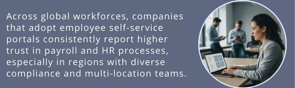 Female employee reviewing HR self-service portal on laptop in office