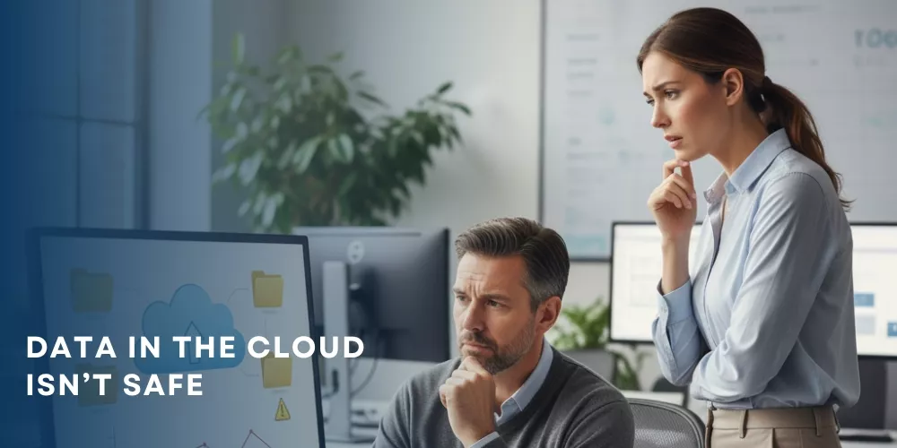 Concerned employee viewing cloud data security alert on screen Concerned employee viewing cloud data security alert on screen