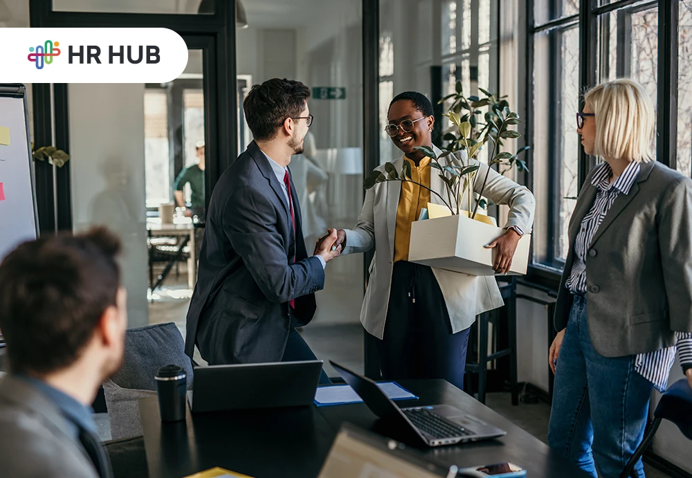 Team working together in the office, shifting from remote to in-person in 2025